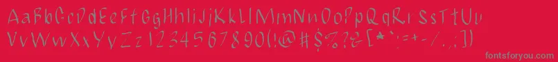 フォントJbmCalligrad – 赤い背景に灰色の文字