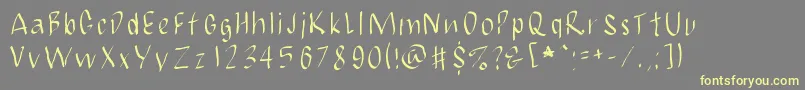 JbmCalligrad-fontti – keltaiset fontit harmaalla taustalla