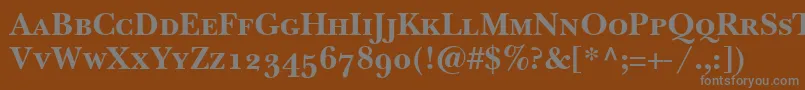 BaskervilleSmallCapsSsiBoldSmallCaps-fontti – harmaat kirjasimet ruskealla taustalla