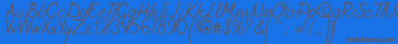 Czcionka Fely – brązowe czcionki na niebieskim tle