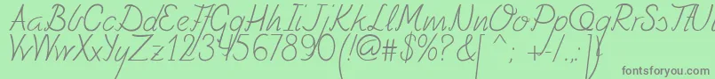 Fely Font – Gray Fonts on Green Background