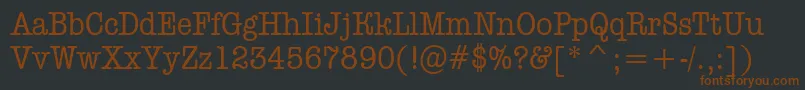 Шрифт AOldtypernr – коричневые шрифты на чёрном фоне