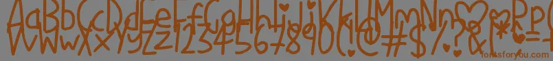 Saiba mais sobre a fonte LoveMe Fonte LoveMe – fontes marrons em um fundo cinza