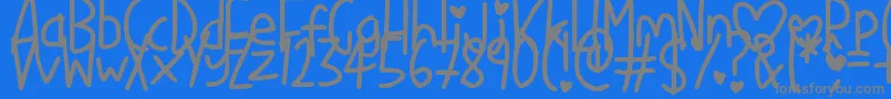 Weitere Informationen zur LoveMe-Schriftart LoveMe-Schriftart – Graue Schriften auf blauem Hintergrund