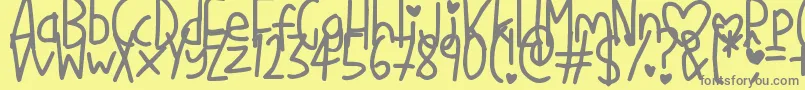 Lisätietoja LoveMe-fontista LoveMe-fontti – harmaat kirjasimet keltaisella taustalla
