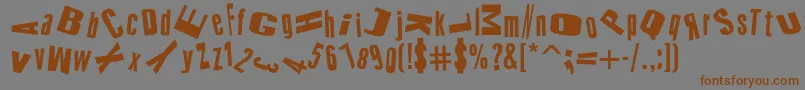 フォントCrazyStyle – 茶色の文字が灰色の背景にあります。
