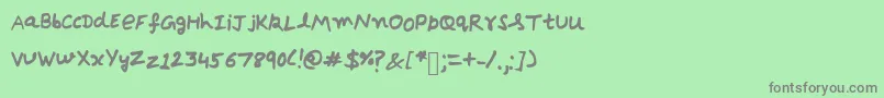 フォントDebrieBold – 緑の背景に灰色の文字