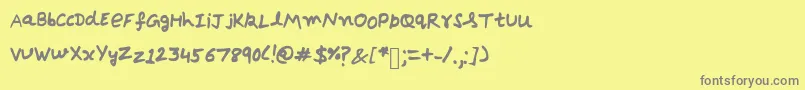 フォントDebrieBold – 黄色の背景に灰色の文字