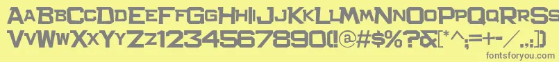 フォントBachelor – 黄色の背景に灰色の文字