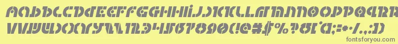 フォントQuestlokital – 黄色の背景に灰色の文字