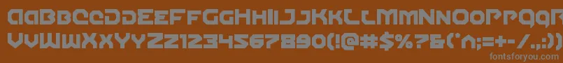 Gunnerstorm-fontti – harmaat kirjasimet ruskealla taustalla