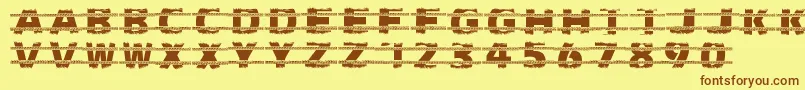 Trackers Font – Brown Fonts on Yellow Background