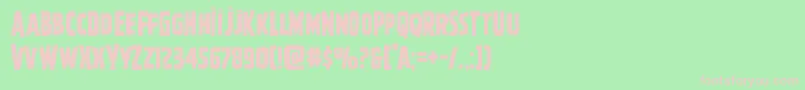 フォントGhoulishintentcapshift – 緑の背景にピンクのフォント