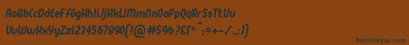 Queerstreet-fontti – mustat fontit ruskealla taustalla