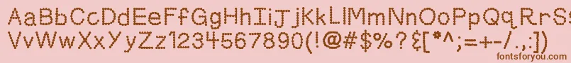 フォントKbskittledup – ピンクの背景に茶色のフォント