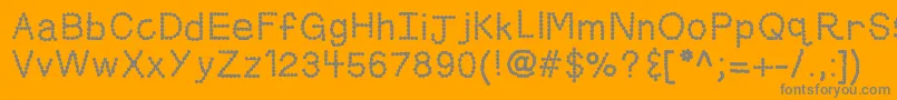 Czcionka Kbskittledup – szare czcionki na pomarańczowym tle