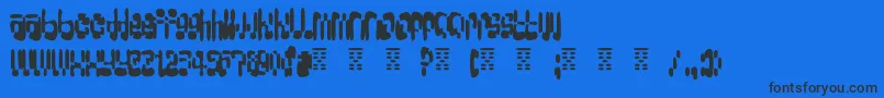 BigLoadaSplatter-fontti – mustat fontit sinisellä taustalla