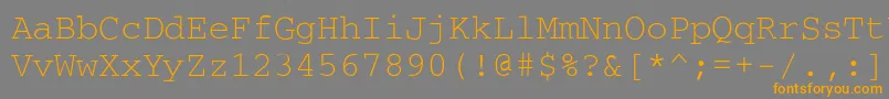 フォントCourier – オレンジの文字は灰色の背景にあります。