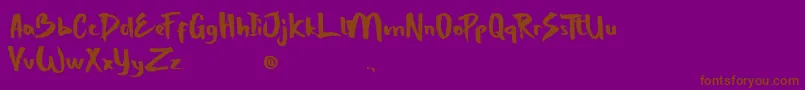 StrongBoldOne-Schriftart – Braune Schriften auf violettem Hintergrund