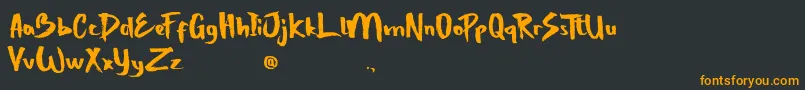 StrongBoldOne Font – Orange Fonts on Black Background