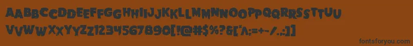 Goblincreekstag Font – Black Fonts on Brown Background