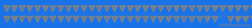 Fonte PaperBannerBold – fontes cinzas em um fundo azul