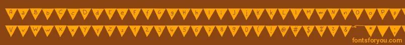 PaperBannerBold Font – Orange Fonts on Brown Background