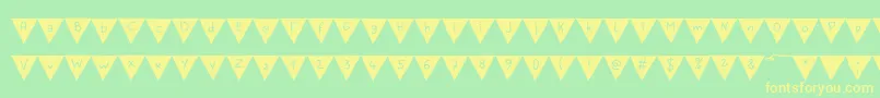 PaperBannerBold Font – Yellow Fonts on Green Background