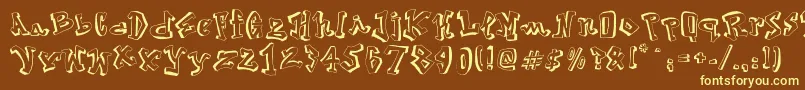Street2Art-fontti – keltaiset fontit ruskealla taustalla