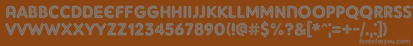 フォントAdamgorry – 茶色の背景に灰色の文字