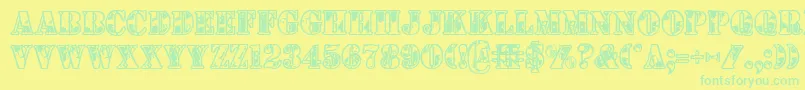 フォント1stcav – 黄色い背景に緑の文字