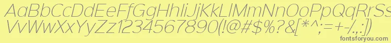 Sinkinsans200xlightitalic-fontti – harmaat kirjasimet keltaisella taustalla