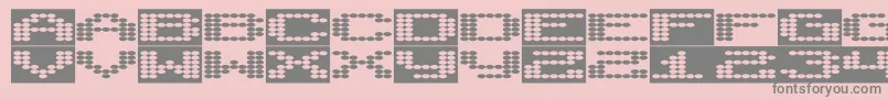 フォントSyntheticsyncronism – ピンクの背景に灰色の文字