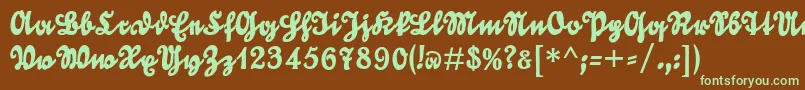 フォントGoldmarieUnz1t – 緑色の文字が茶色の背景にあります。