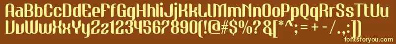 NudelyRegularOneDemoVersion-fontti – keltaiset fontit ruskealla taustalla