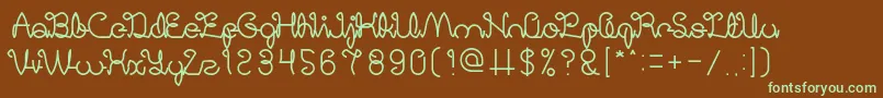 フォントDigitalHandmade – 緑色の文字が茶色の背景にあります。