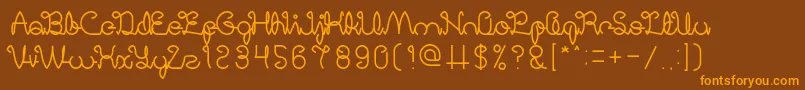 Czcionka DigitalHandmade – pomarańczowe czcionki na brązowym tle