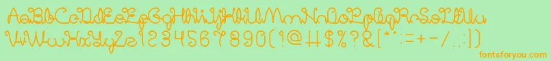 DigitalHandmade-fontti – oranssit fontit vihreällä taustalla