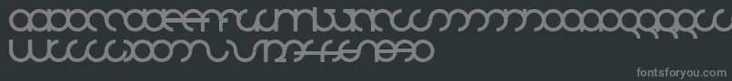 フォントMdrsfd01 – 黒い背景に灰色の文字