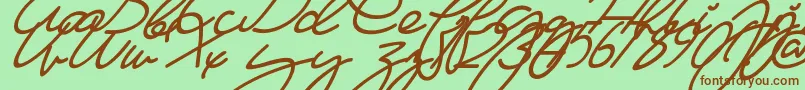 Fonte MaFilleSlant – fontes marrons em um fundo verde