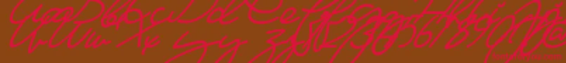 フォントMaFilleSlant – 赤い文字が茶色の背景にあります。