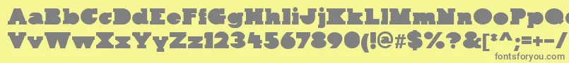 KaineBlock Font – Gray Fonts on Yellow Background