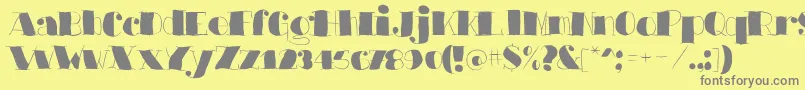 Barkantsblack-Schriftart – Graue Schriften auf gelbem Hintergrund