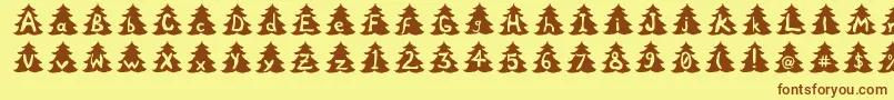 フォントChristmasTree – 茶色の文字が黄色の背景にあります。