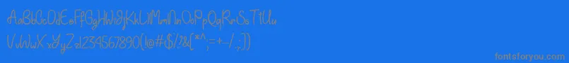 EinhornSchriftTtf-Schriftart – Graue Schriften auf blauem Hintergrund