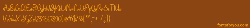 EinhornSchriftTtf Font – Orange Fonts on Brown Background