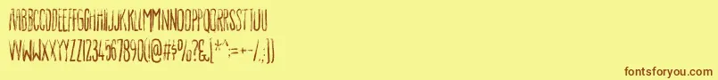 フォントLuxuriousdemo – 茶色の文字が黄色の背景にあります。