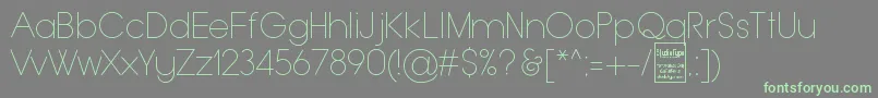 フォントTypoGroteskThinDemo – 灰色の背景に緑のフォント