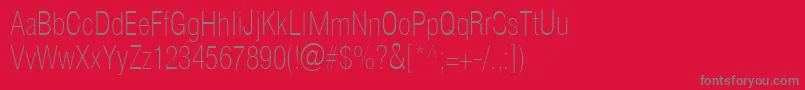 Helioscondthin-Schriftart – Graue Schriften auf rotem Hintergrund