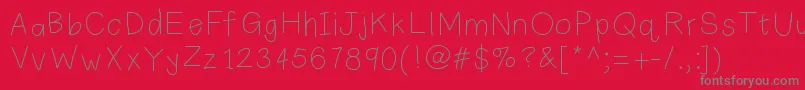 Plainprint-Schriftart – Graue Schriften auf rotem Hintergrund